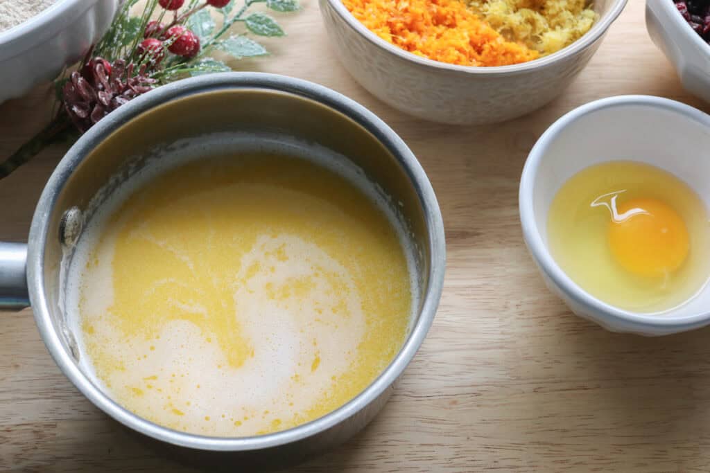 melted butter and milk in a saucepan to make fresh milled Christmas Stollen bread