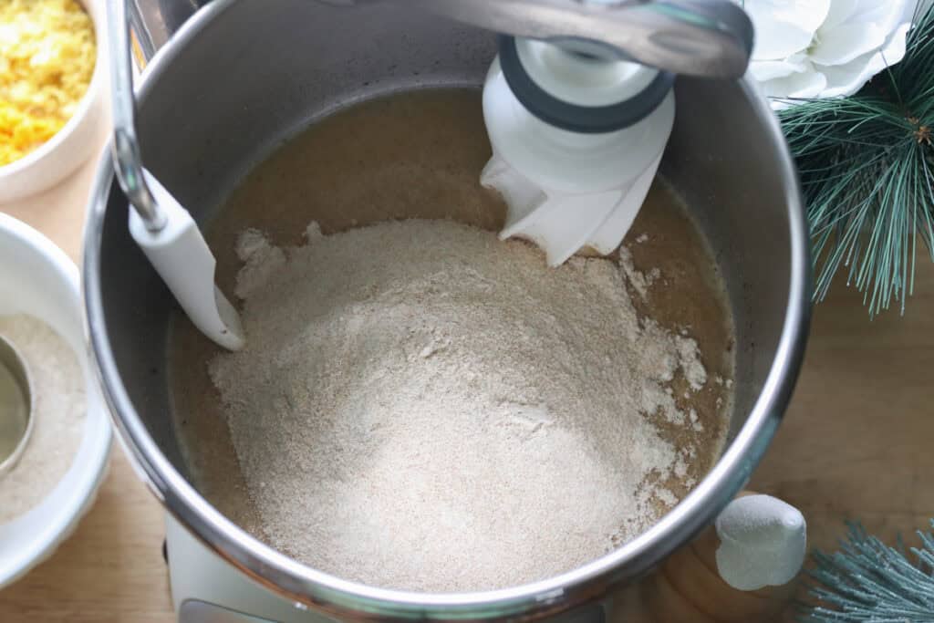 flour added to a mixing bowl to make fresh milled Christmas Stollen bread