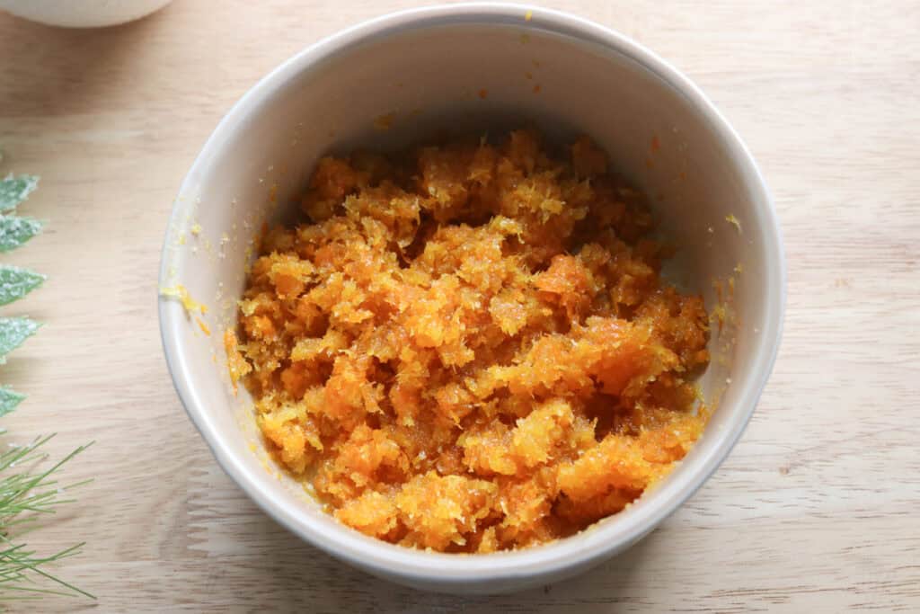 orange and lemon zest in a bowl to go inside of fresh milled Christmas Stollen bread