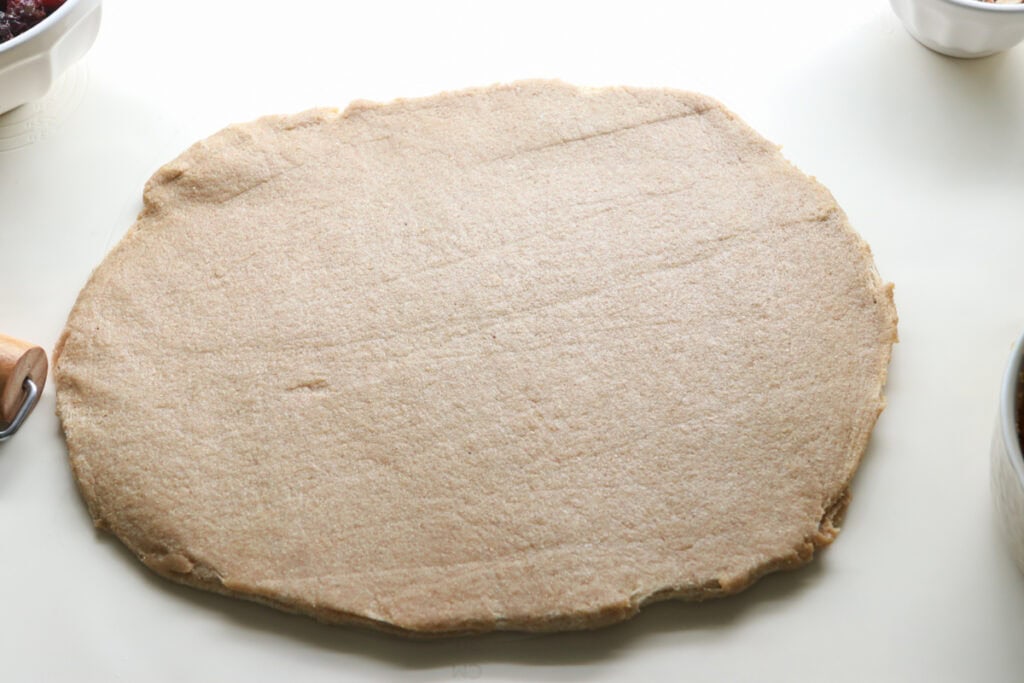 fresh milled Christmas Stollen dough rolled into an oval