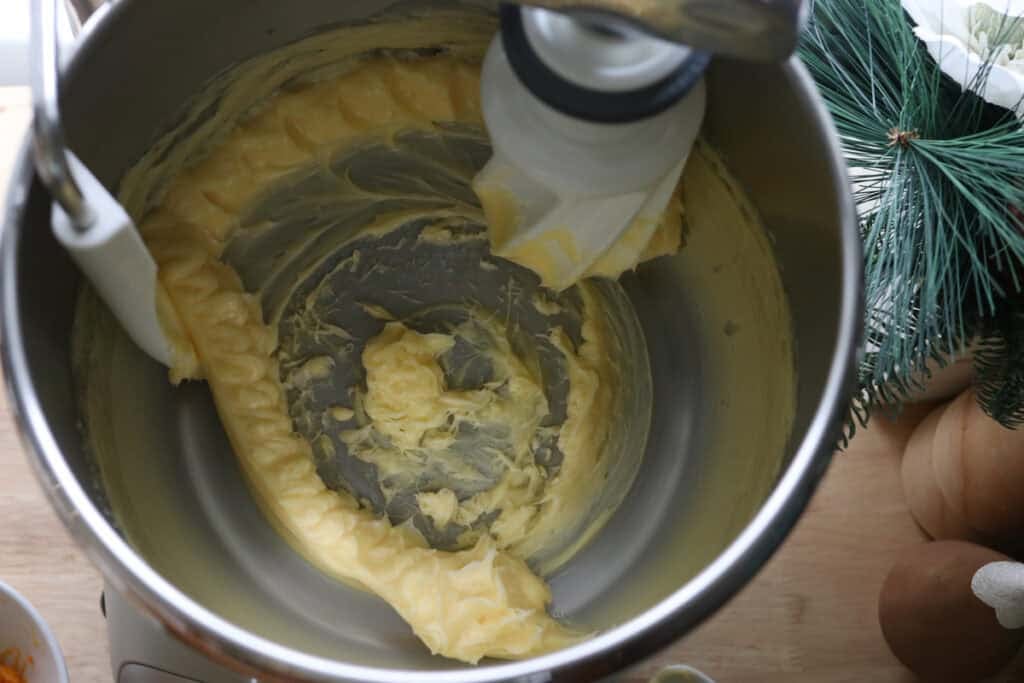 butter and honey in a mixing bowl to make Homemade Mini Panettones with Fresh Milled Flour