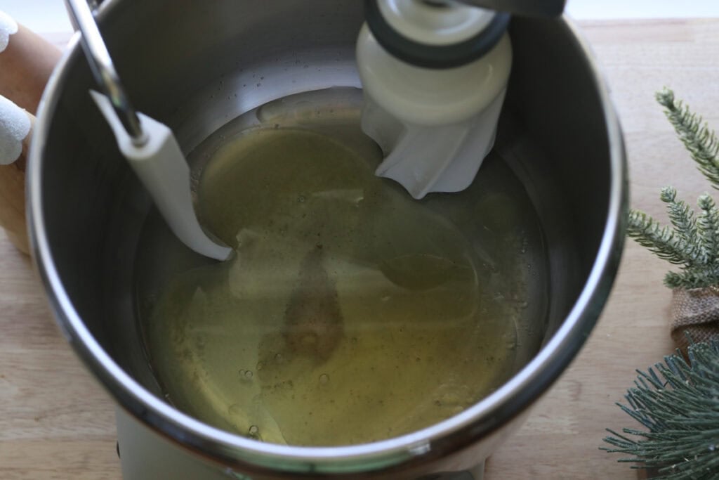 oil, water, and honey in a bowl to make Fresh Milled Cheesy Pull-Apart Christmas Tree Bread