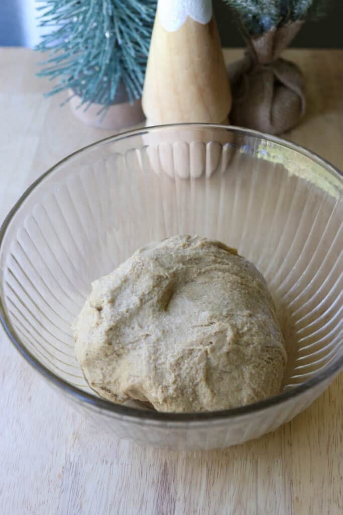 dough rising in a bowl for Fresh Milled Cheesy Pull-Apart Christmas Tree Bread