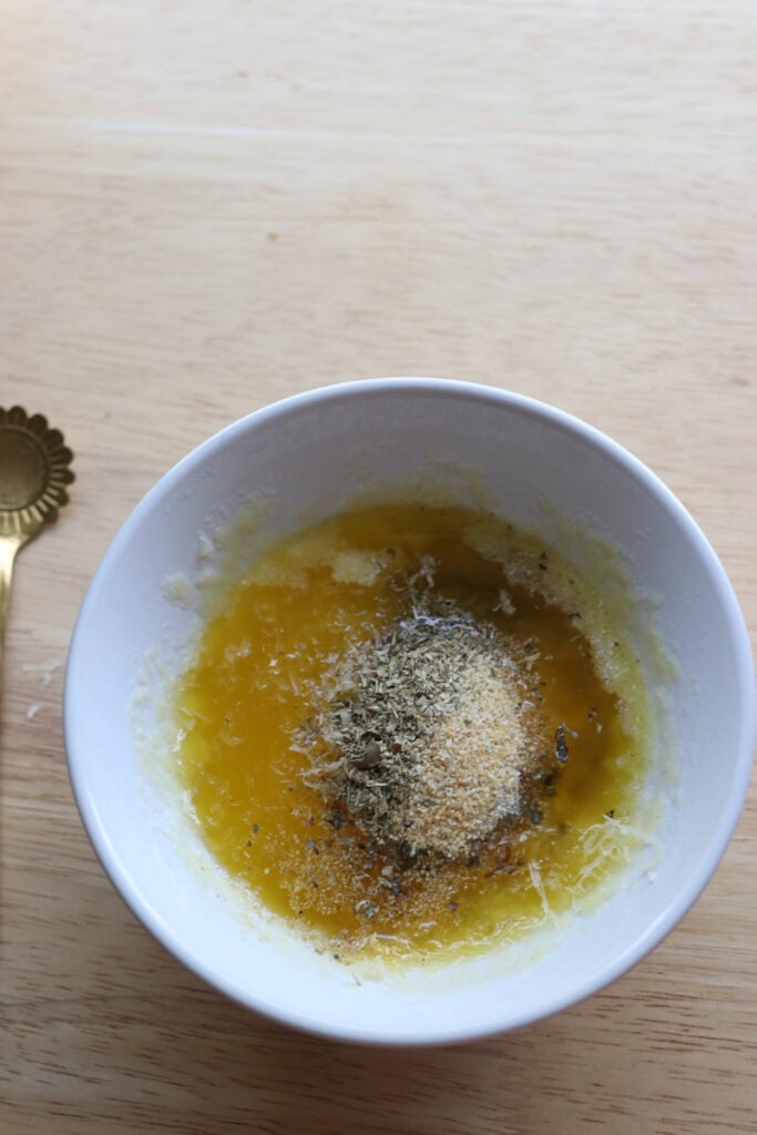 ingredients for garlic butter in a bowl to brush on Fresh Milled Cheesy Pull-Apart Christmas Tree Bread