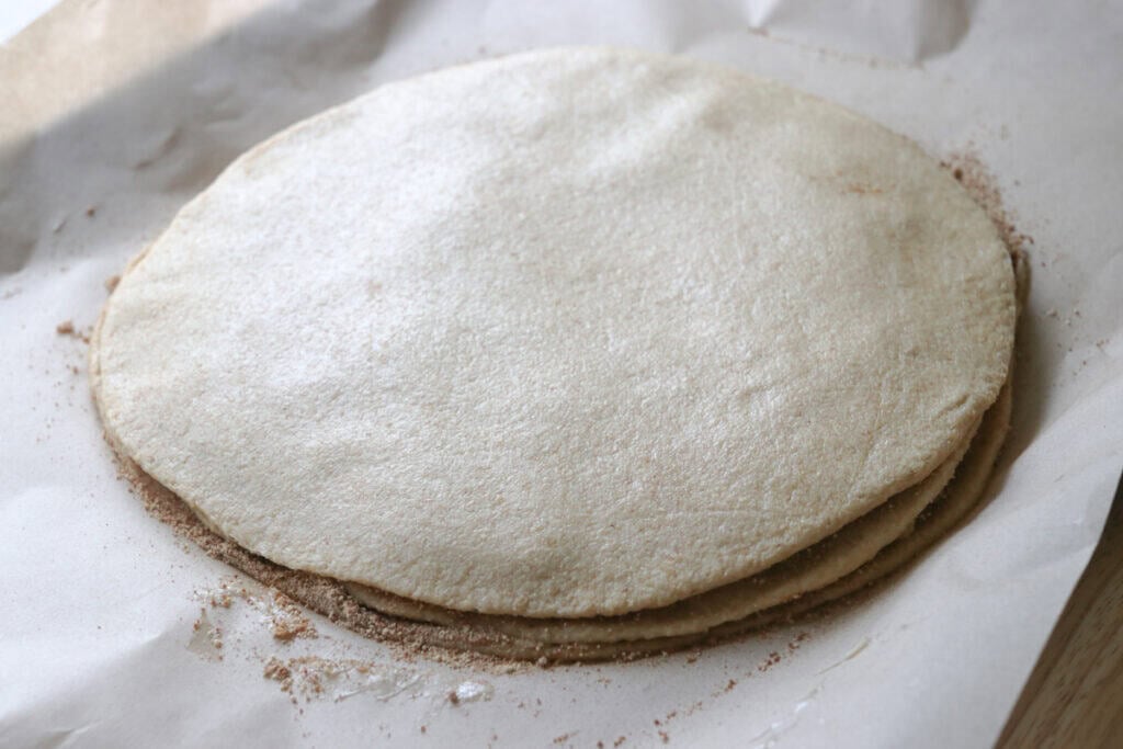 3 layers of fresh milled cinnamon sugar star dough stacked on top of each other