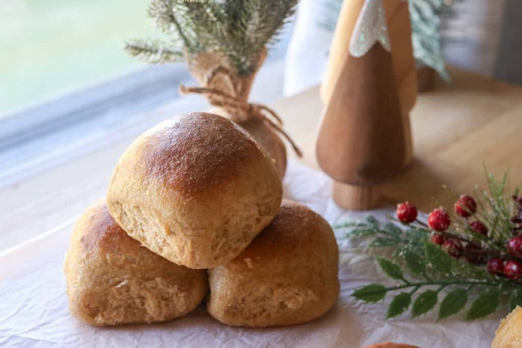 3 fresh milled fluffy Christmas dinner rolls stacked together