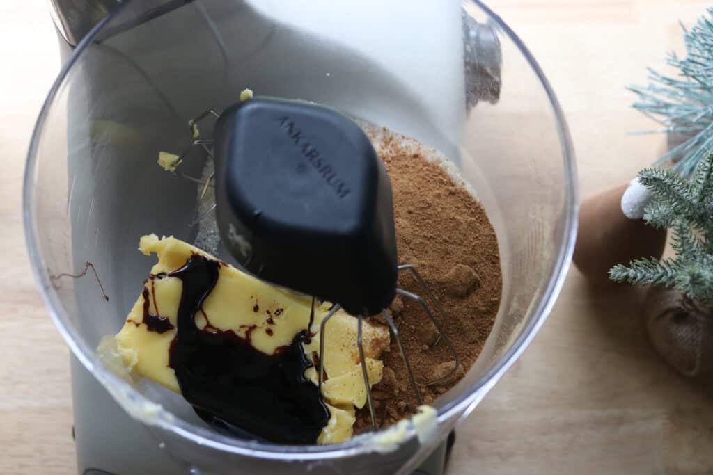 butter, molasses, and sugar in a mixing bowl to make fresh milled gingersnap cookies