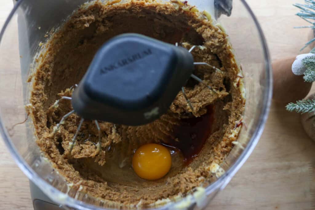 egg and vanilla in a mixing bowl to make fresh milled gingersnap cookies