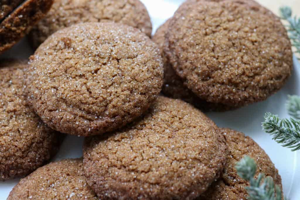 fresh milled gingersnap cookies on a white plate