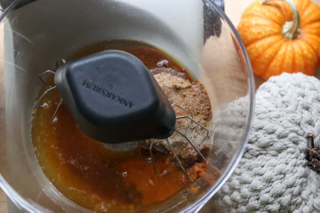 brown butter and sugar in a mixing bowl to make Freshly Milled Brown Butter Maple Pumpkin Cookies
