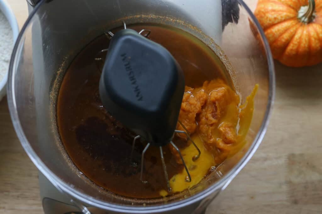 pumpkin puree and egg added to a mixing bowl to make Freshly Milled Brown Butter Maple Pumpkin Cookies