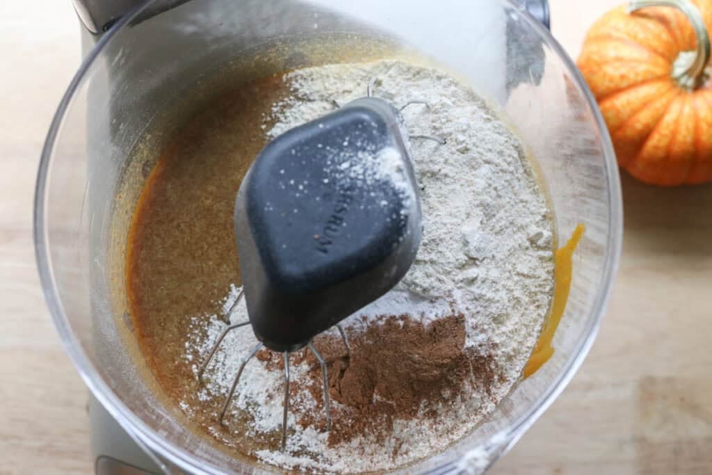 flour and spices in a mixing bowl to make Freshly Milled Brown Butter Maple Pumpkin Cookies