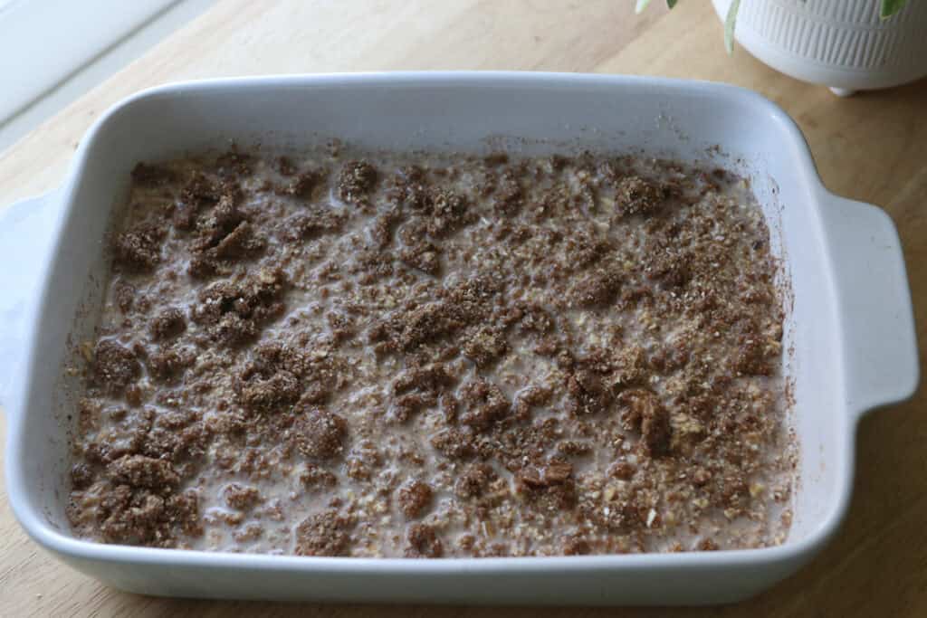Healthy Cinnamon Coffee Cake Baked Oatmeal in a casserole dish to be baked