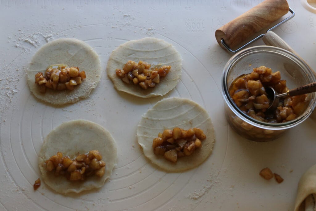 freshly milled pie crust filled with apple filling to make freshly milled healthy apple hand pies