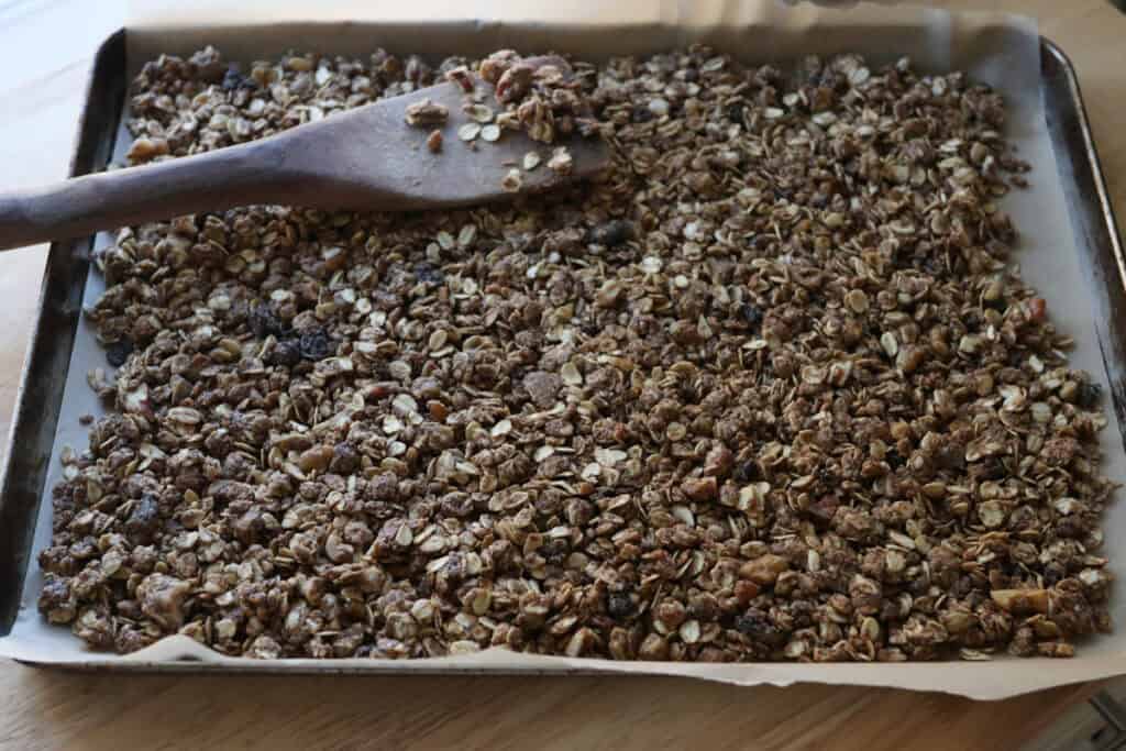Healthy and Crunchy Protein-Packed Granola that has been spread out on a baking sheet