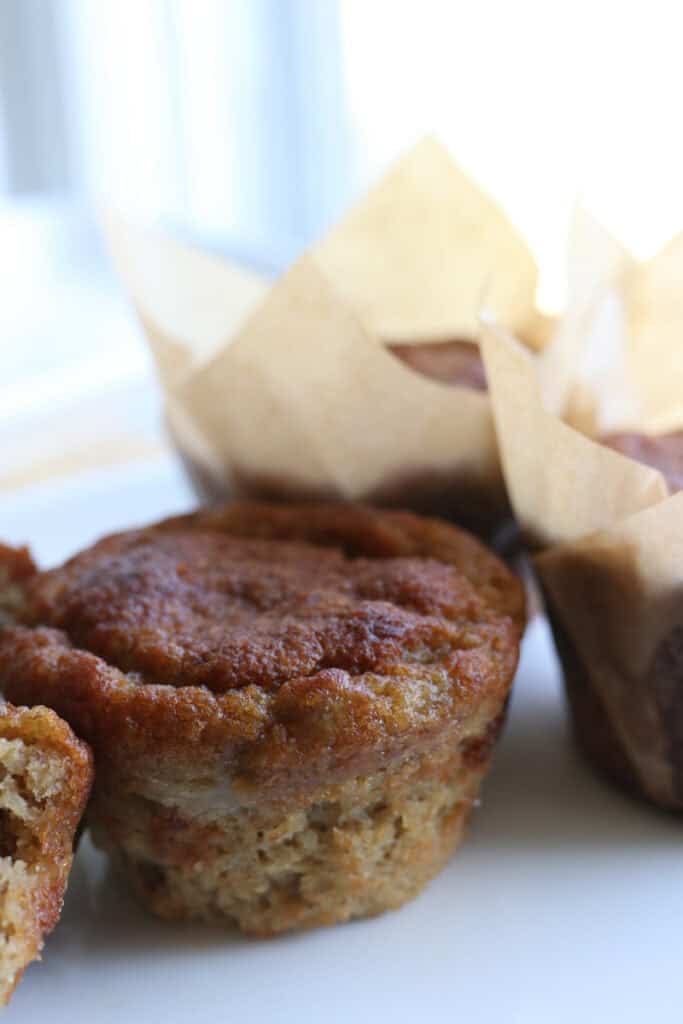 The Best High Protein Easy Banana Muffin that is cooked to golden brown on top