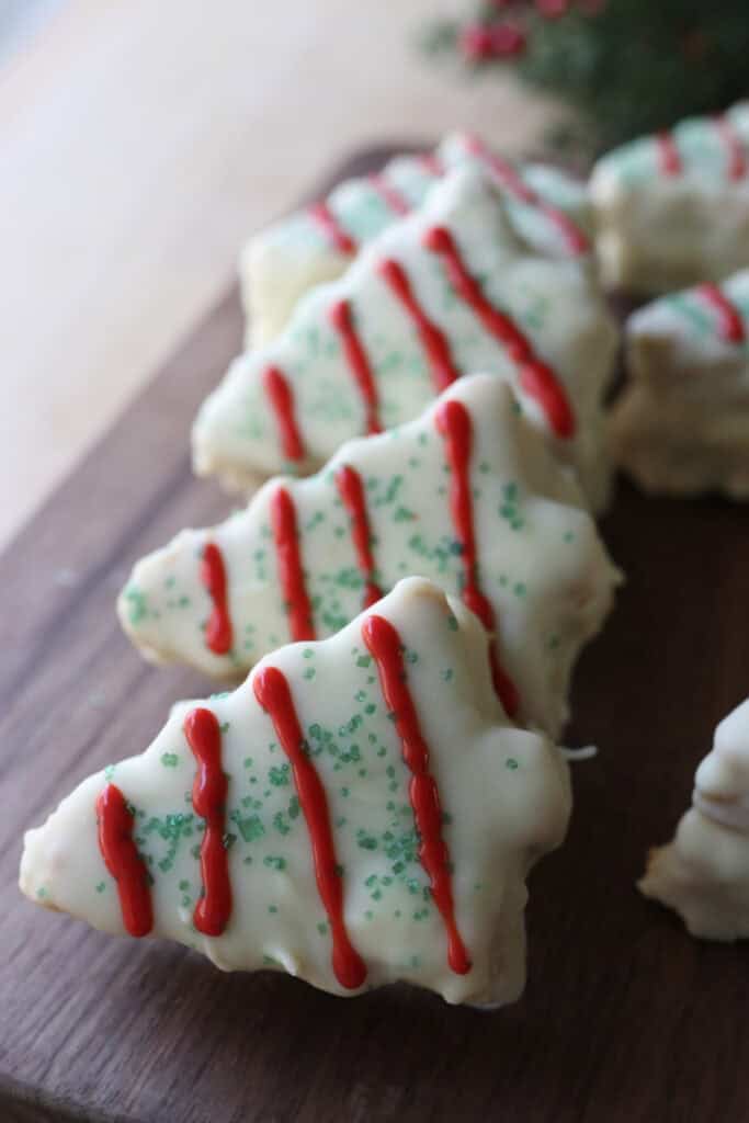 Fresh Milled Little Debbie Christmas Tree Cakes stacked together and coated in white chocolate