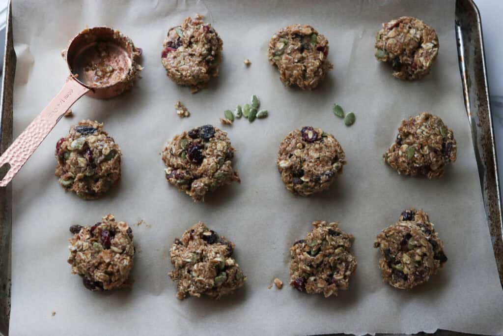 Easy and Healthy Breakfast Oatmeal Cookies scooped out on a baking sheet 