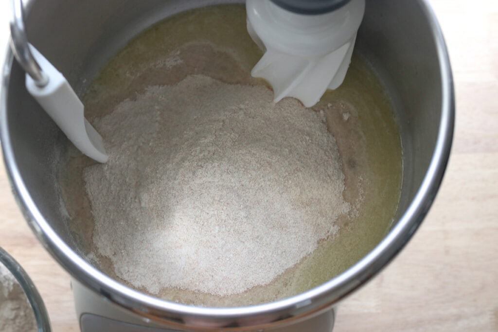 flour and butter in a mixing bowl to make freshly milled soup bread bowls