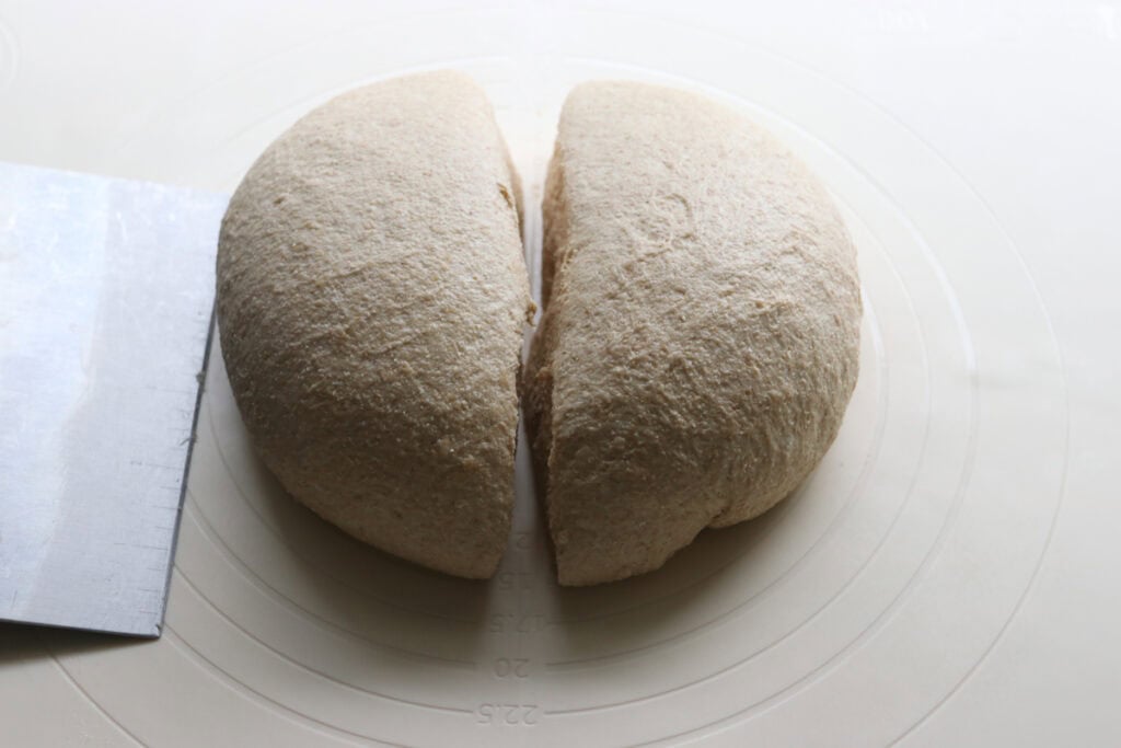 freshly milled soup bread bowl dough cut in half