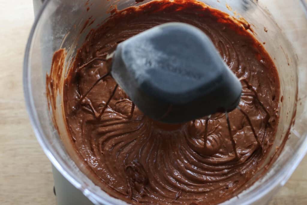 chocolate that has been added to a mixing bowl to make fresh milled buckeye brownie cookies