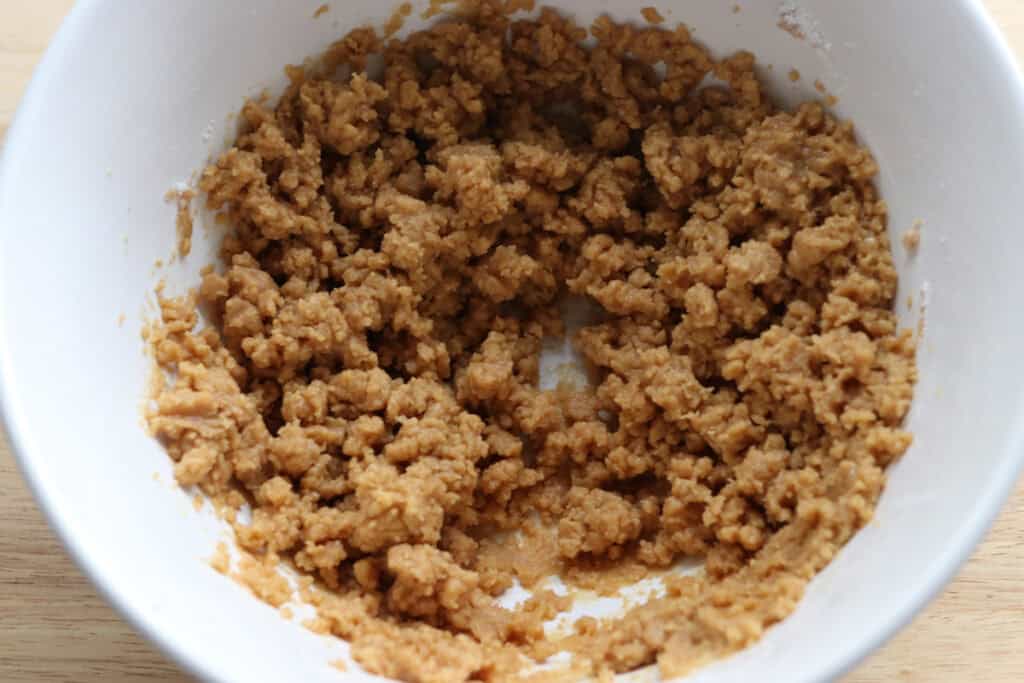 peanut butter and powdered sugar that has been beaten together for the filling for fresh milled buckeye brownie cookies