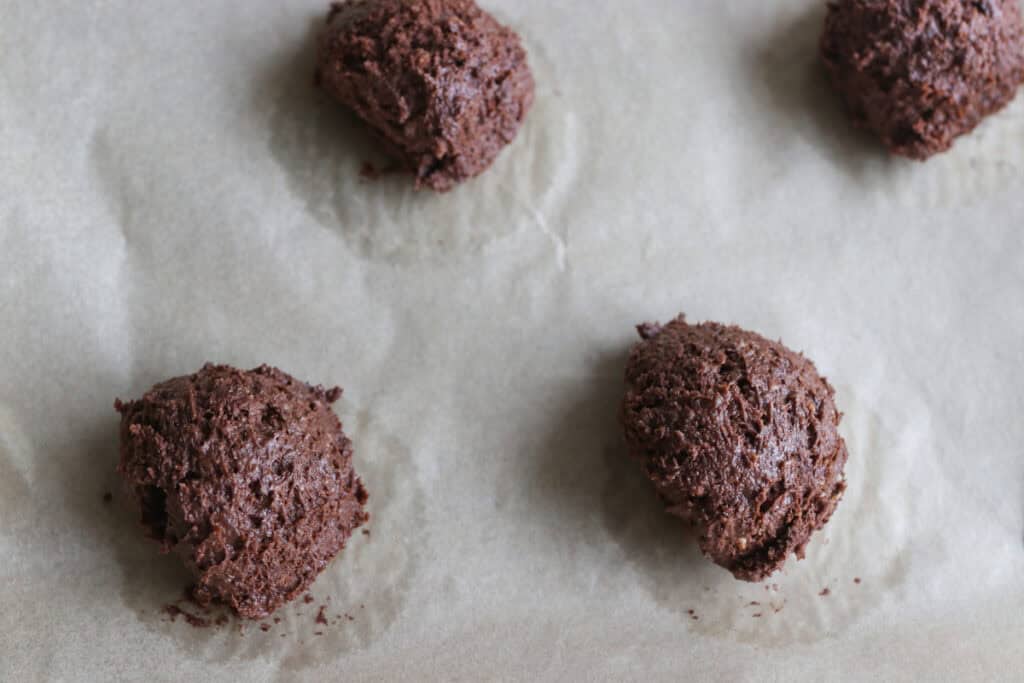 fresh milled buckeye brownie cookie batter scooped onto a baking sheet