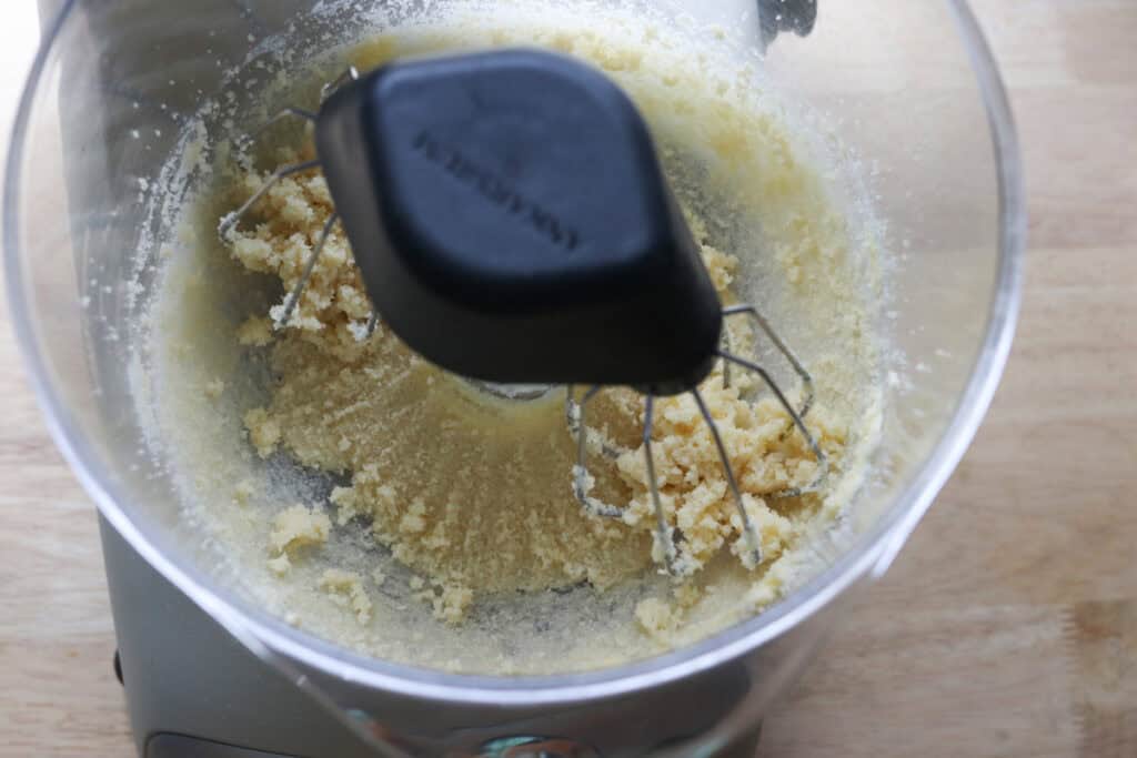 butter and sugar in a mixing bowl to make freshly milled red velvet cupcakes