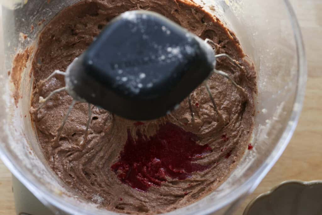 red food coloring added to freshly milled red velvet cupcake batter
