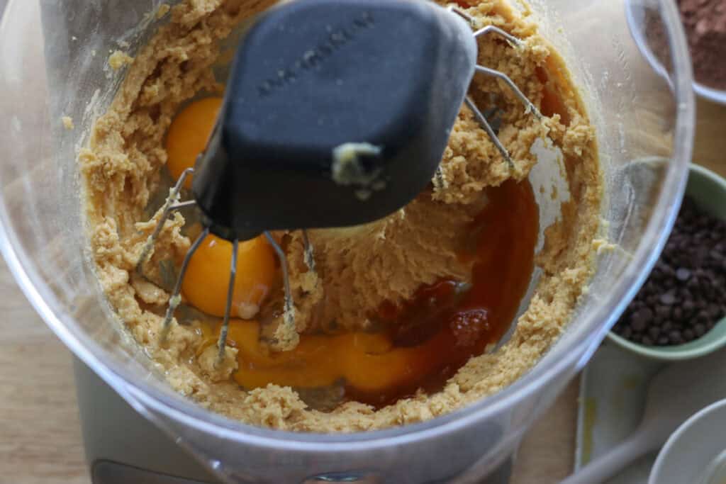eggs and vanilla added to a mixing bowl to make fresh milled double chocolate biscotti