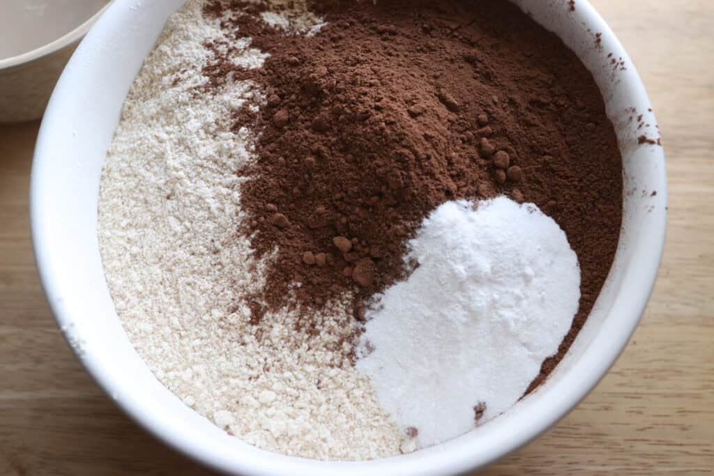 flour and cocoa powder in a bowl to make fresh milled double chocolate biscotti