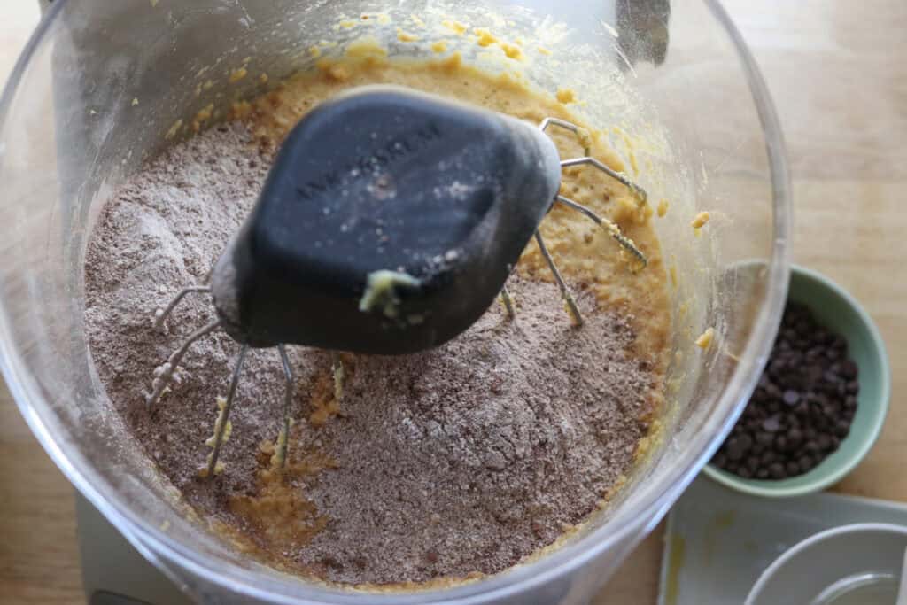 flour and cocoa added to a mixing bowl to make fresh milled double chocolate biscotti