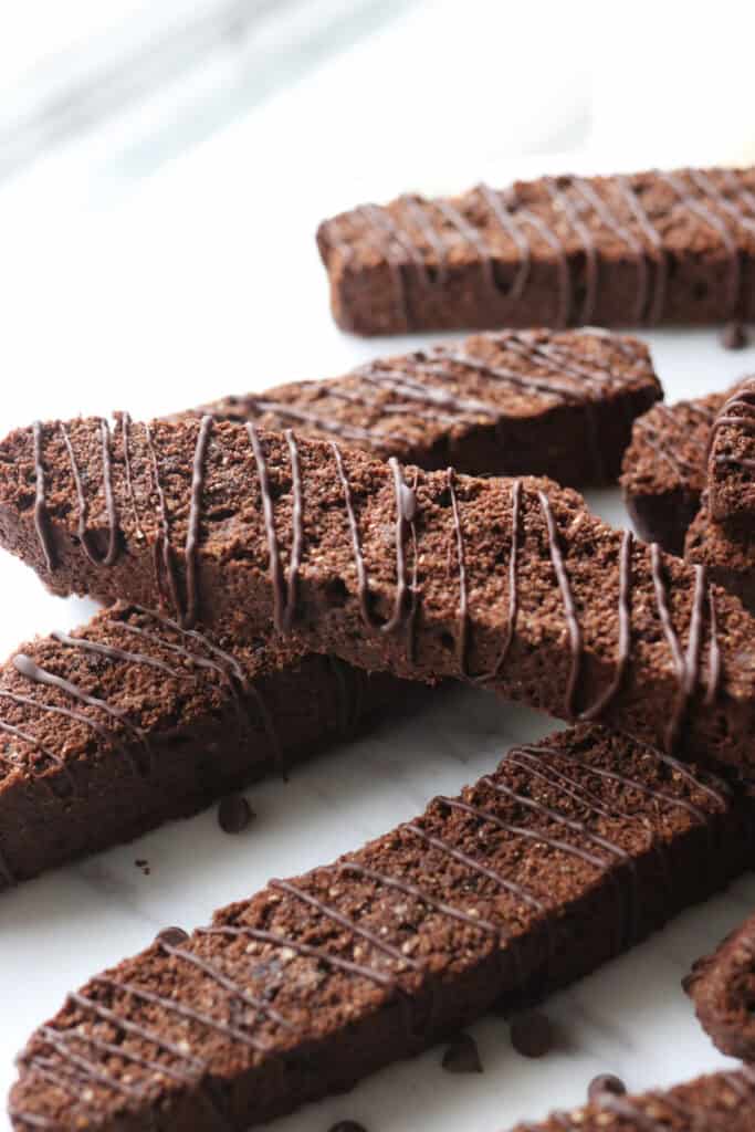 fresh milled double chocolate biscotti that has been drizzled with melted chocolate and has mini chocolate chips