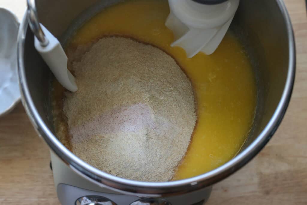 flour added to a mixing bowl to make fresh milled sourdough breadsticks 