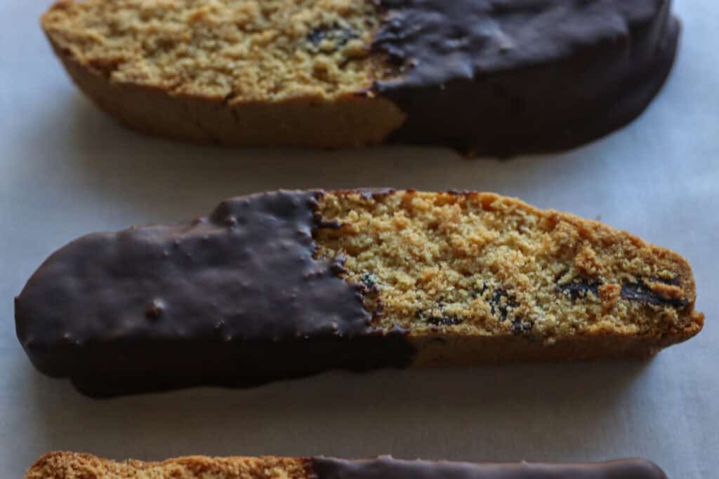 freshly milled chocolate chip biscotti dipped in melted chocolate