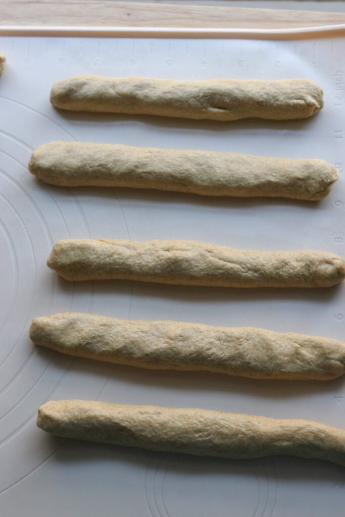 fresh milled sourdough breadstick dough on a silicone mat