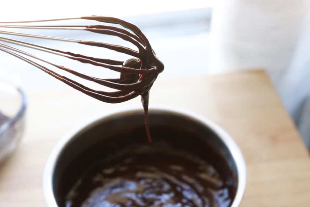 chocolate ganache in a saucepan for freshly milled fudgy cosmic brownies