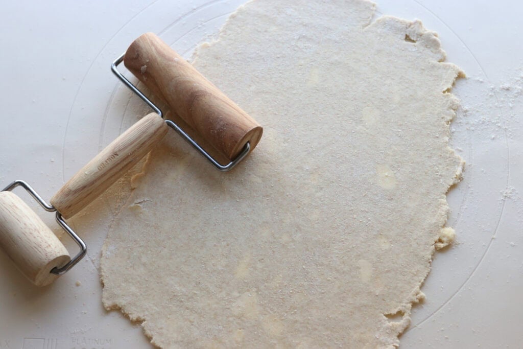 crisp and flaky fresh milled ritz cracker dough that has been rolled out