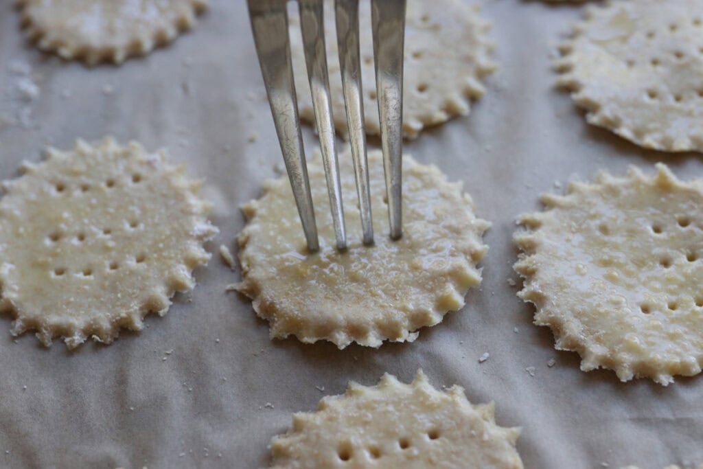 poking holes into crisp and flaky fresh milled ritz crackers