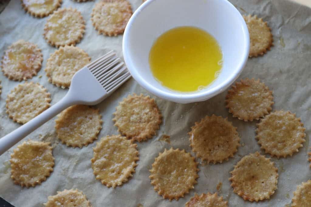 crisp and flaky fresh milled ritz crackers that have been baked and brushed with butter