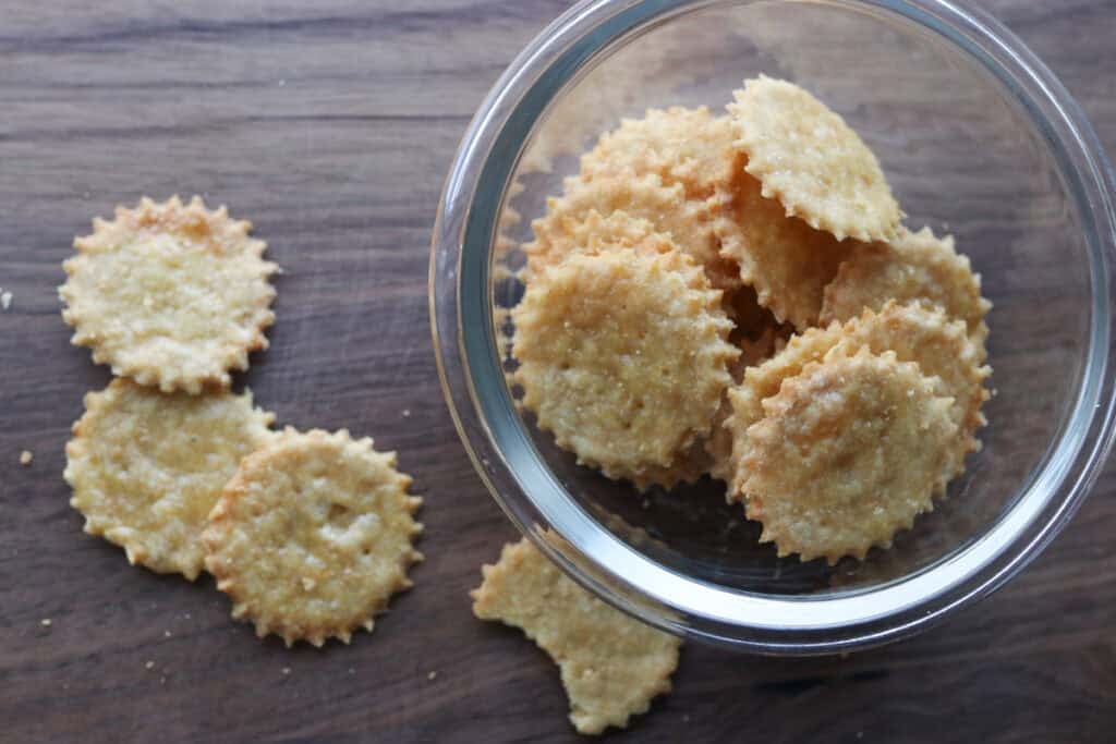 crisp and flaky fresh milled ritz crackers in a glass container
