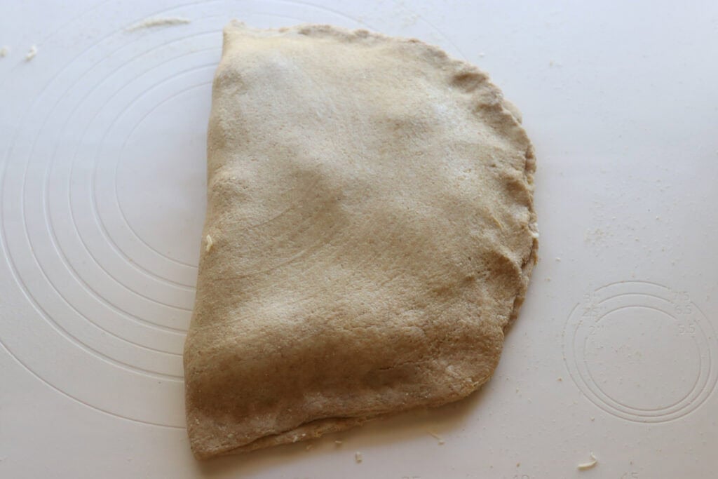 dough that has been pressed together to make fresh milled flaky buttery croissants