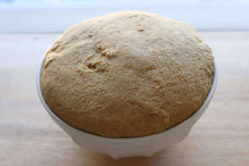 Freshly Milled Valentine's Strawberry Cinnamon Roll dough that has doubled in size