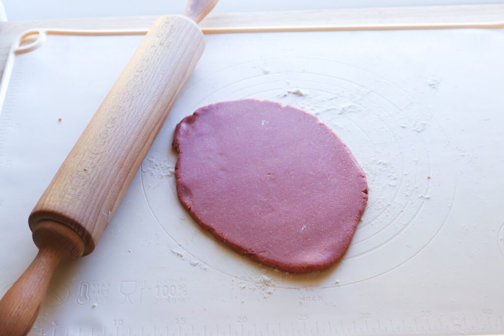 pink dough that has been rolled out to make Freshly Milled Slice and Bake Valentine's Cookies