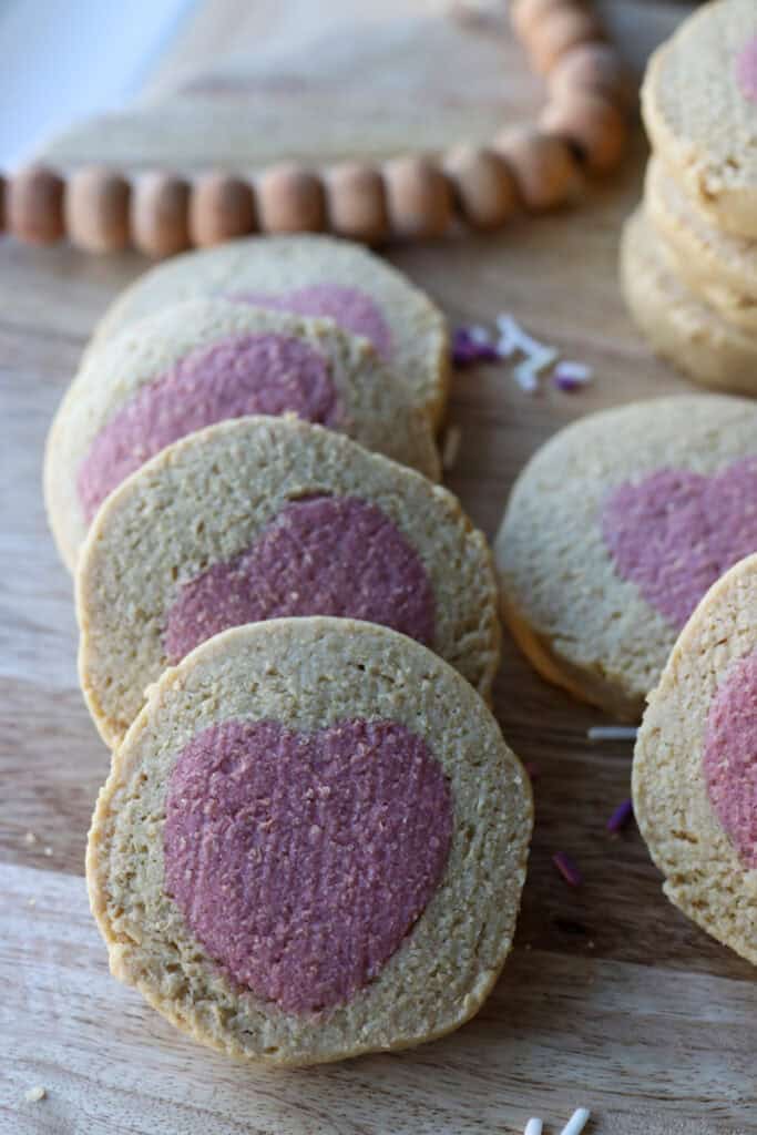 Freshly Milled Slice and Bake Valentine's Cookies stacked together with pink hearts in the middle