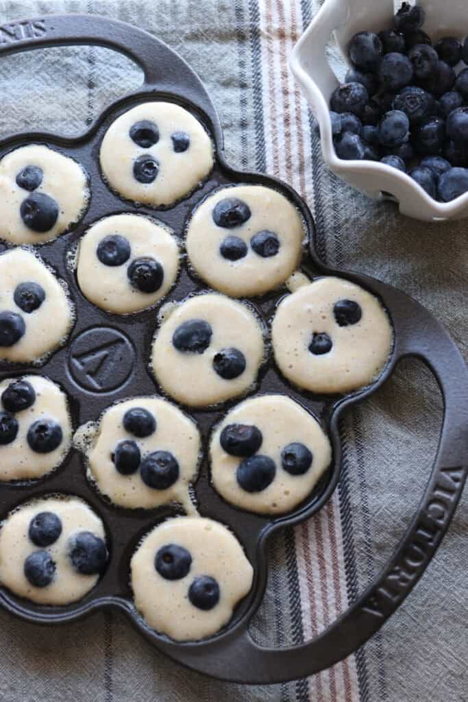 Freshly Milled Fluffy Lemon Blueberry Pancake batter in a cast iron pan