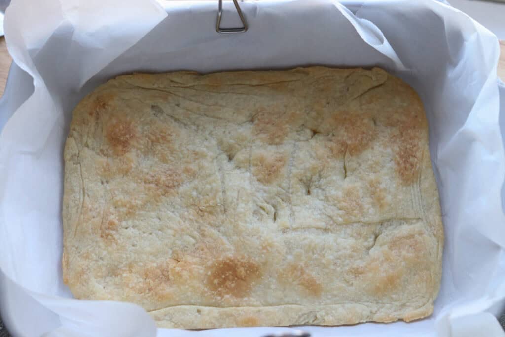 pie crust that has been baked to make The Best Blueberry Pie Bars with Fresh Milled Flour