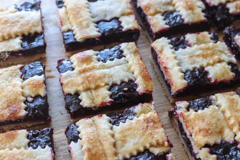 The Best Blueberry Pie Bars with Fresh Milled Flour on a wooden board