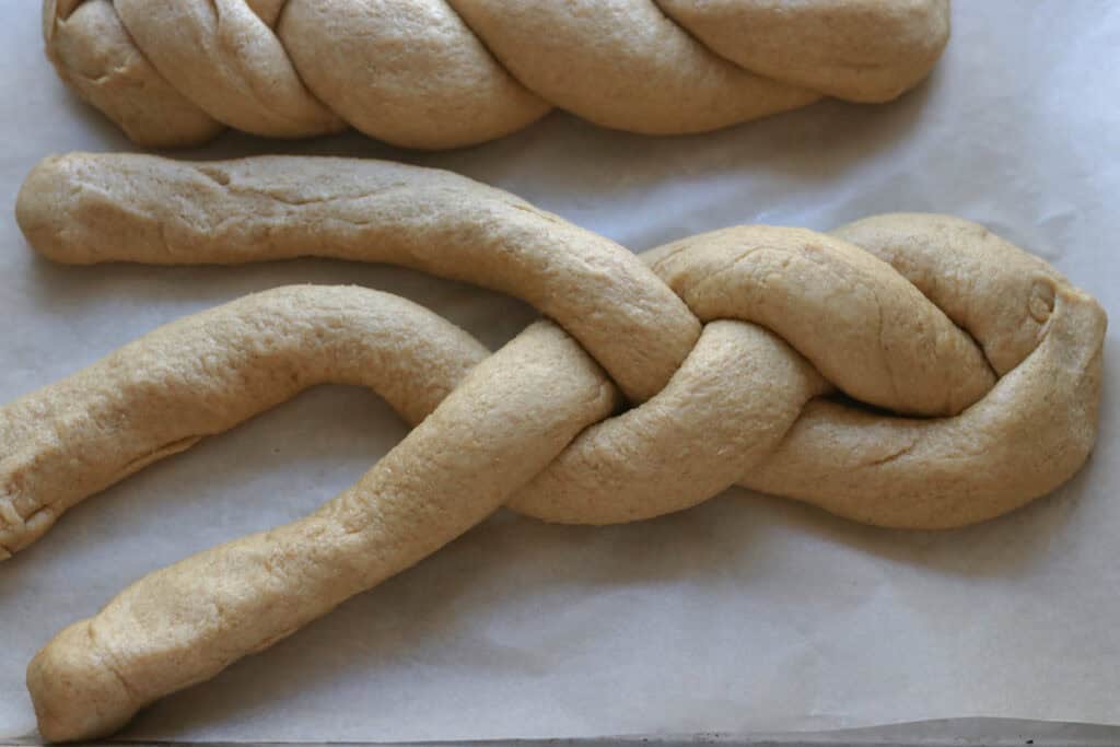 braiding freshly milled braided challah dough