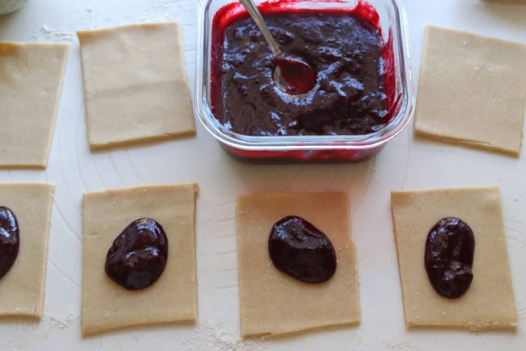 freshly milled homemade pop-tart dough with wild berry jam in the middle